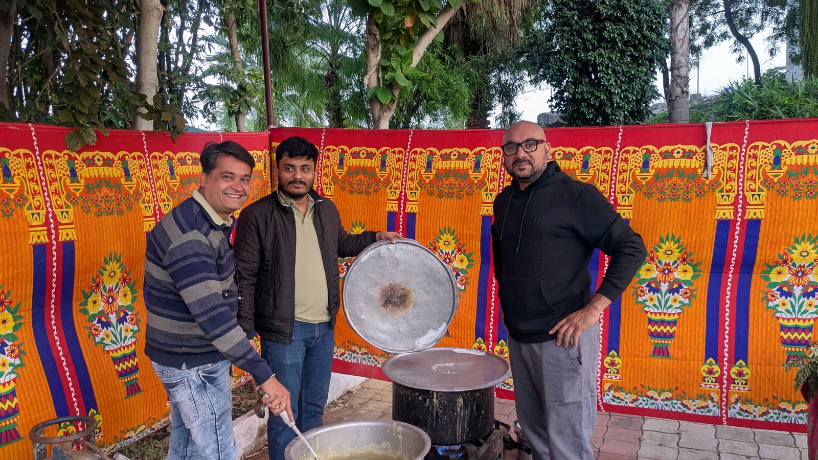 farmkart team preparing a communal meal at a festive celebration
