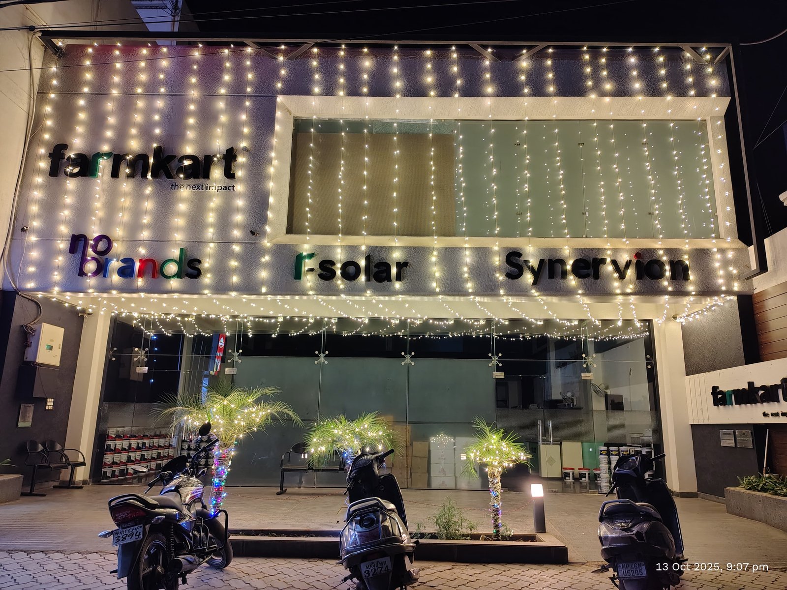 farmkart headquarters in Indore lit up at night with festive lights