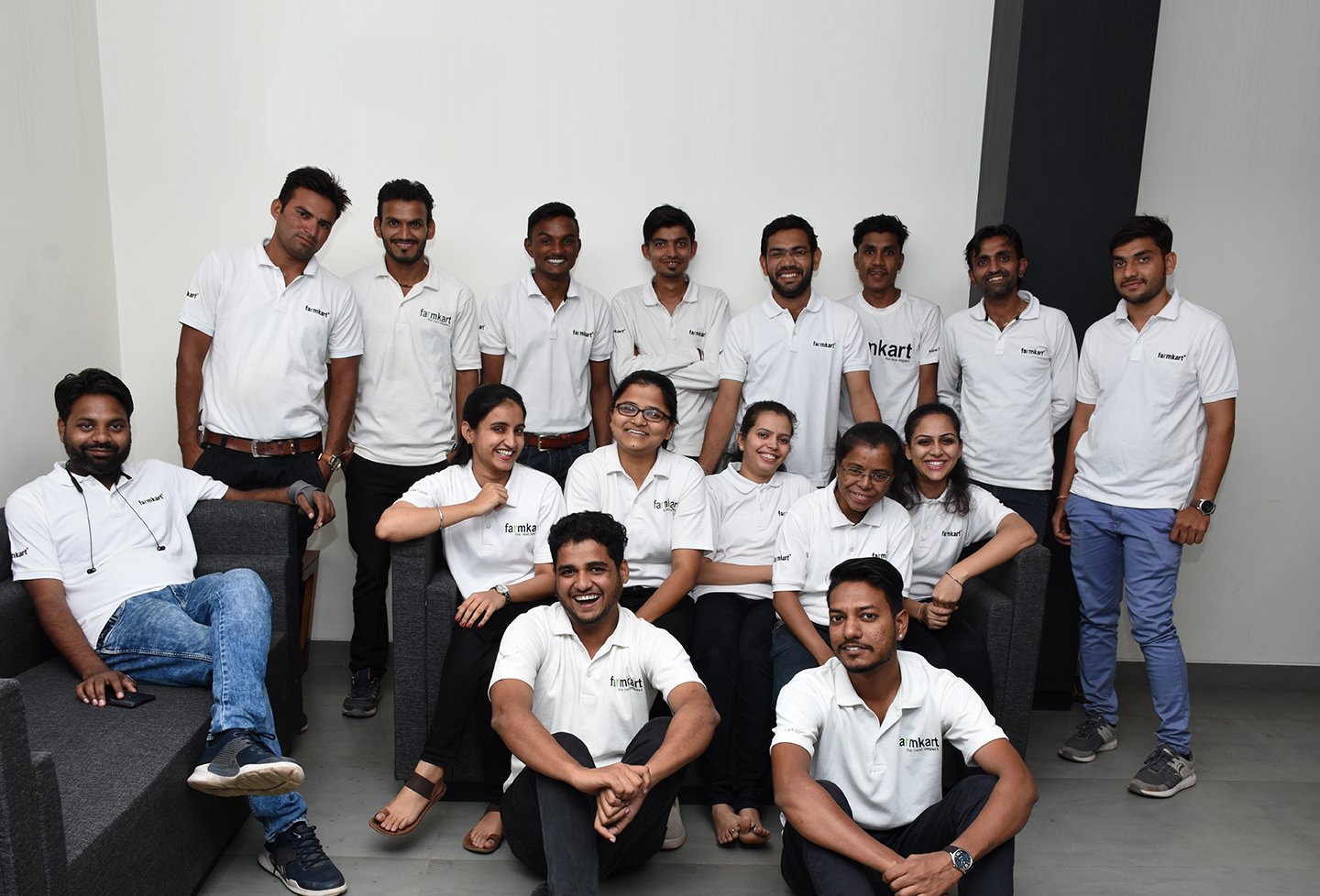farmkart team in branded white t-shirts posing in the Indore office